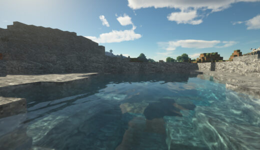 Minecraft SEUS PTGI HRR 日中の岩に囲まれた水辺の画像